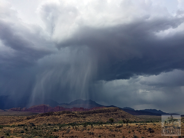 A photo of puring rain while Horseback Riding in Las Vegas at Cowboy Trail Rides in Red Rock Canyon