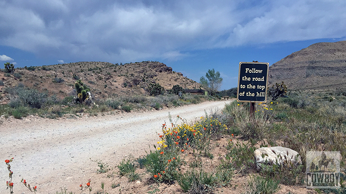 A picture of a sign directing you to the hill where you will Horseback Riding in Las Vegas at Cowboy Trail Rides in Red Rock Canyon