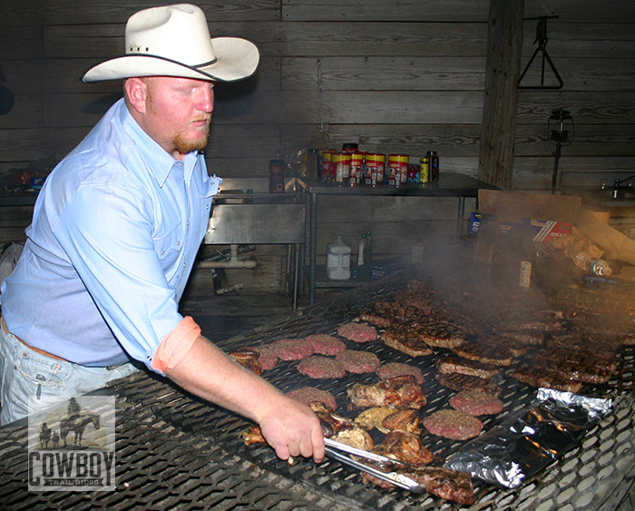 Cowboy Trail Rides - Buck Sage cookin' up meat on the mesquite BBQ